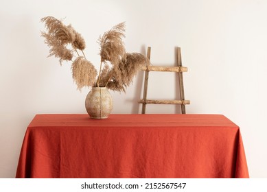 Home Decor Concept, Table With Terracotta Tablecloth, Selective Focus Image