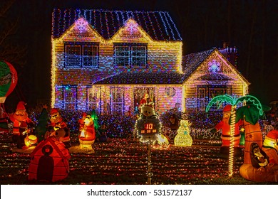 A Home Decorated And Lighted With 650,000 Lights And Over 60 Inflatables For Christmas And For New Year Eve At Night In Virginia