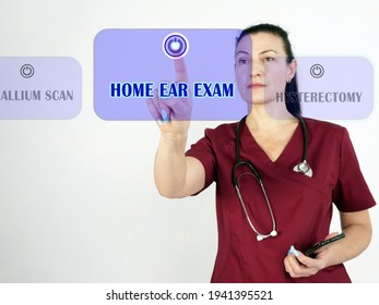  HOME EAR EXAM Inscription On The Screen. Close Up Physician Hands Holding Black Smart Phone.
