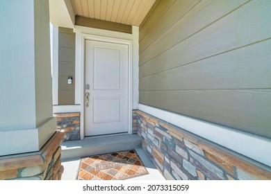 Home Entrance Exterior With White Door And Doormat