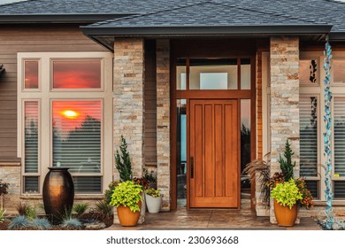 Home Exterior Detail With Reflection Of Colorful Sunset