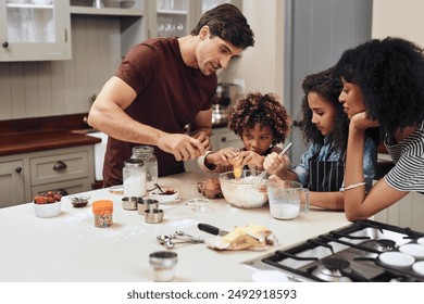 Home, family and baking with recipe, ingredients and care with hobby, routine and time together. Apartment, parents and mother with father in kitchen, children or kids with utensils, help or teaching - Powered by Shutterstock