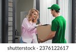 Home fast delivery service. Man courier bring mail package. Girl open door take pack. Woman buy post parcel. E commerce job. Delivery guy give order. Postal box deliver. Happy male adult put signature