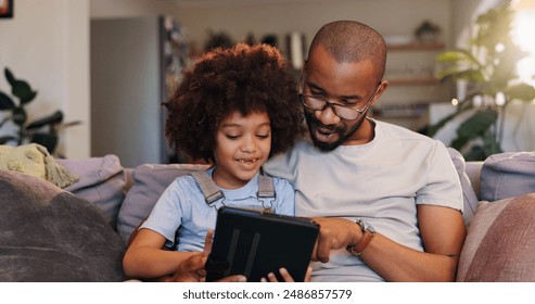 Home, father and child on tablet for social media, bonding or streaming online for movie, film or video series. Ebook, reading or single parent with boy, child or touchscreen for learning development - Powered by Shutterstock