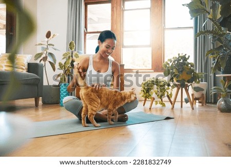 Home fitness, yoga or happy woman with cat or pet animal relaxing for wellness or healthy lifestyle. Smile, calm or active zen girl loves bonding, caring or playing with kitten or kitty in house