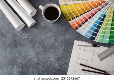 Home floor plans, building structural blueprint projects, color scheme palette guide catalog with colour swatches, accessories for architect or interior designer. Flat lay composition with copy space. - Powered by Shutterstock