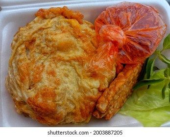 Home Food Menu, Fried Egg Salad With Chili Sauce In Plastic Wrap.