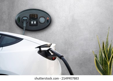 Home garage charging electric vehicle with cable  EV Tesla