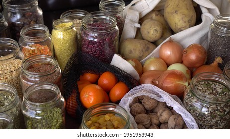 Home Grocery Reserve. Zero Waste Pantry. Food Shopping And Storing In Glass Jars: Grains, Legumes, Seeds, Nuts, Dried Herbs, Dried Fruit, Cereals, Spices. Fruits And Vegetables In Reusable Bags