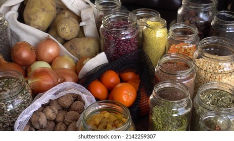 Home Grocery Reserve. Zero Waste Pantry. Food Shopping And Storing In Glass Jars: Grains, Legumes, Seeds, Nuts, Dried Herbs, Dried Fruit, Cereals, Spices. Fruits And Vegetables In Reusable Bags