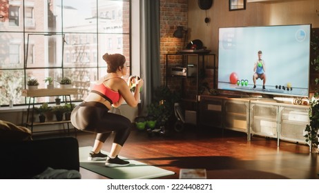 Home Gym: Gorgeous Plus Size Body Positive Girl Training With Personal Trainer Via Online Video Tutorial. Authentic Woman Uses Workout Service Fitness App, Streaming Virtual Training