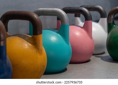 At home gym including kettlebell weights, person getting fit and strong - Shutterstock ID 2257936733