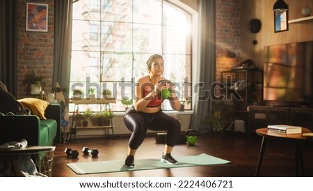Home Gym Training: Gorgeous Plus Size Body Positive Girl Exercising. Strong Sportswoman Lifting Weights, Workout. Fitness, Sweat, Determination. Portrait of Successful Powerful Woman