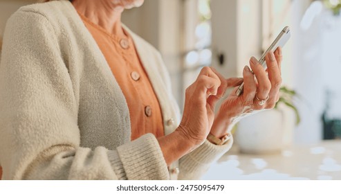 Home, hand and senior woman with phone for network, communication and scroll on technology. House, internet and elderly person with smartphone for digital media, information and online news website - Powered by Shutterstock