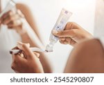 Home, hands and woman with toothpaste, brush and wellness with hygiene in bathroom. Person, closeup and girl with dental care, healthy teeth and remove plaque with routine, cleaning and morning