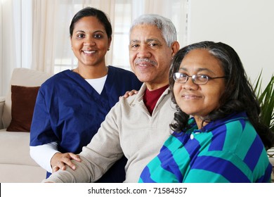 Home Health Care Worker And An Elderly Couple