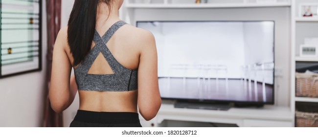 Home Healthy Exercise Concept, Asian Fit Woman Stay Home And Training Online Sport Workout Class On Tv At Home, New Normal Life Of Covid-19 Outbreak