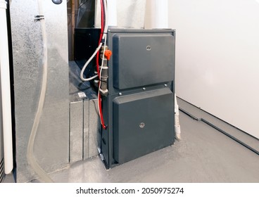 A home high energy efficient furnace in a basement