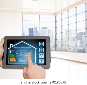 home, housing, people and technology concept - close up of man hands pointing finger to tablet pc computer and regulating room temperature over empty flat background - Shutterstock ID 270195875