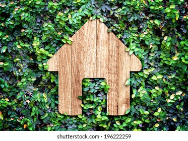 Home Icon On Green Leaves Wall,Eco Home System.