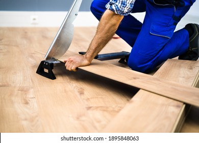 Home Improvement Job. Carpentry Equipment Tool For Laying New Hardwood Floor - Shutterstock ID 1895848063