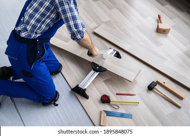 Home Improvement Job. Carpentry Equipment Tool For Laying New Hardwood Floor - Shutterstock ID 1895848075