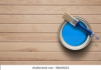 Home improvement, paint can on the clear wooden background with copy space - Powered by Shutterstock
