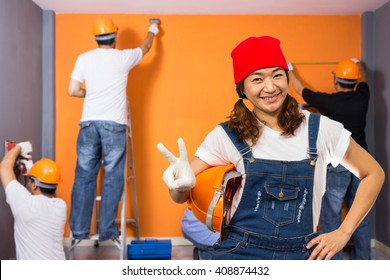 Home Improvement , Renovation Set. Asian Smiling Cute Female & Male Craftsman Group Working Indoor