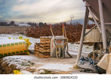 Home Improvement In The Winter With A Wheel Barrow In The Sunset