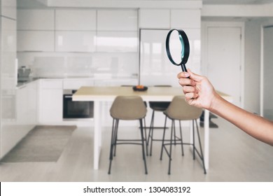 Home Inspection - Magnifying Glass Inspector Looking At Kitchen House Background.