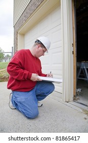 Home Inspector Looking For Possible Problems For A Potential Buyer, Found Rotted Wood Frame On Exterior Door Frame