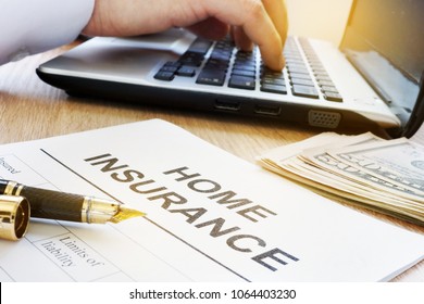 Home insurance form on a table in an agency.