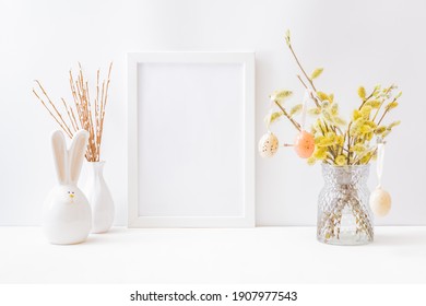 Home Interior With Easter Decor. Mockup With A White Frame And Willow Branches In A Vase On A Light Background