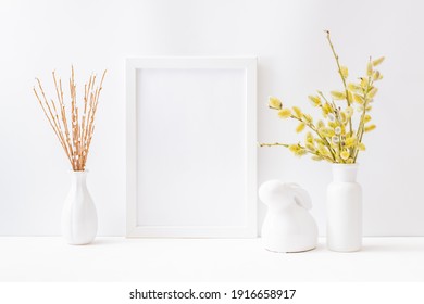 Home Interior With Easter Decor. Mockup With A White Frame And Willow Branches In A Vase On A Light Background