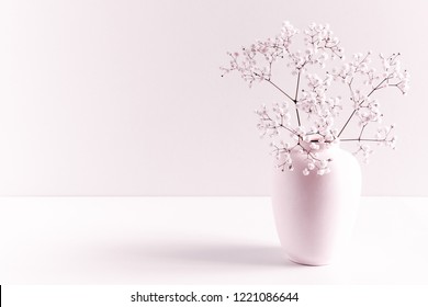 Home Interior Floral Decor. Elegant Floral Soft Pink Composition. Beautiful Flowers In  Vase On Pastel Pink Wall Background. 