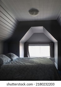 Home Interior Room Furniture Photo With Bed And Pillows. Loft Bedroom In Monochromatic Colors.