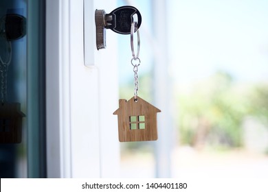 Home Key For Unlocking The New House Door. Renting, Buying, Selling Houses  