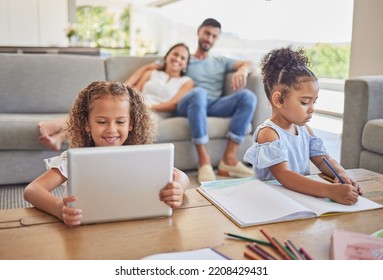 Home Learning Sisters, Kids Writing And Girls With Tablet Watching Educational Video In Living Room While Mom And Dad Relax On Sofa. Education And Children Drawing In Family Home In Brazil