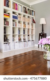 Home Library With White Bookcase In Modern House 