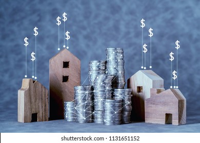 home loan business ideas concept with house model and money coin stack with free copy space for your creativity ideas text