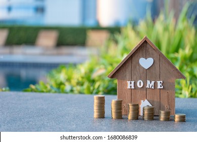 Home Loan With Coin Graph.Refinance Your House With Copy Space.Home Mortgage Credit.