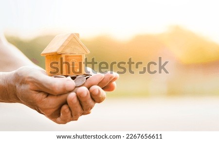 Home loan, home insurance, family life assurance protection, financial mortgage for house building, and legacy planning investment concept with children - parent's hands holding private property