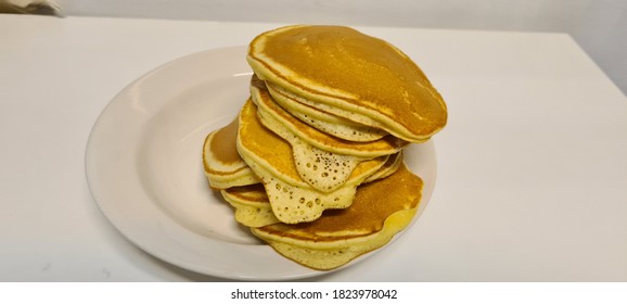 Home Made Asian Family Ugly Small Pancakes On White Background And White Plate