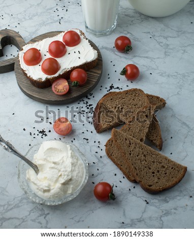 Similar – Tomatencremesuppe in roter Schüssel auf Grunge-Hintergrund