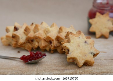 Home Made Butter Cookies Star Shaped With Dried Cranberries And Cranberry Jam