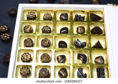 Home Made Chocolates Decorated In Gift Box, A Perfect Fit For Birthdays, Festivals, Special Occasions Like Christmas And New Year. Yummy Chocolates Presented Beautifully In A Decorative Box.