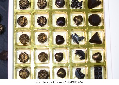 Home Made Chocolates Decorated In Gift Box, A Perfect Fit For Birthdays, Festivals, Special Occasions Like Christmas And New Year. Yummy Chocolates Presented Beautifully In A Decorative Box.