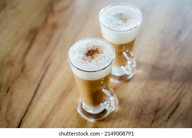 Home Made Coffee Cafe Macchiato On Wooden Table.