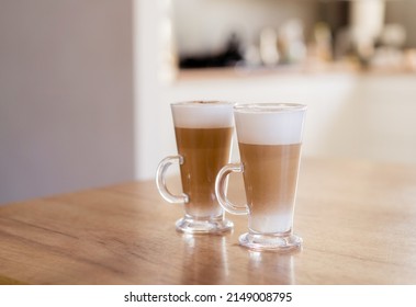 Home Made Coffee Cafe Macchiato On Wooden Table.