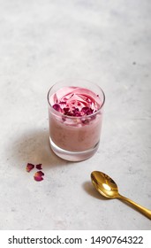 Home Made Fruits Ice Cream With Gold Spoon  On White Table 